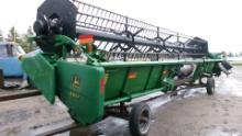 30' JOHN DEERE 930F FLEX, w / Crary AIR REEL, poly is good,  poly auger fingers , PTO hook ups ,